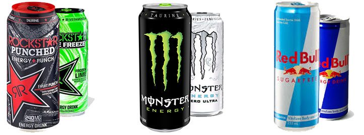 A can of monster energy drink next to an empty can.